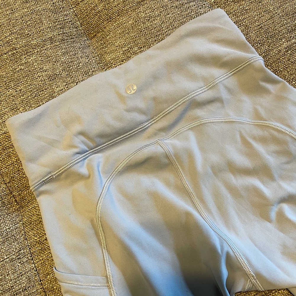 Lululemon, size 4 leggings with pockets.